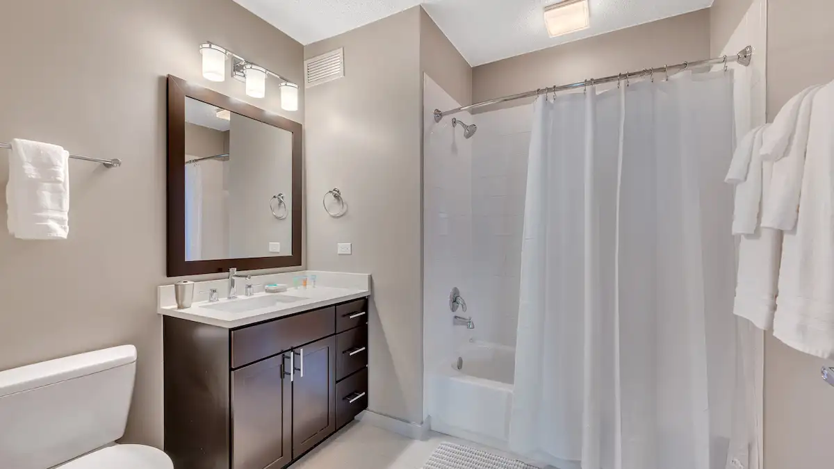 Group of professionals enjoying a luxury furnished corporate apartment in Downtown Chicago.