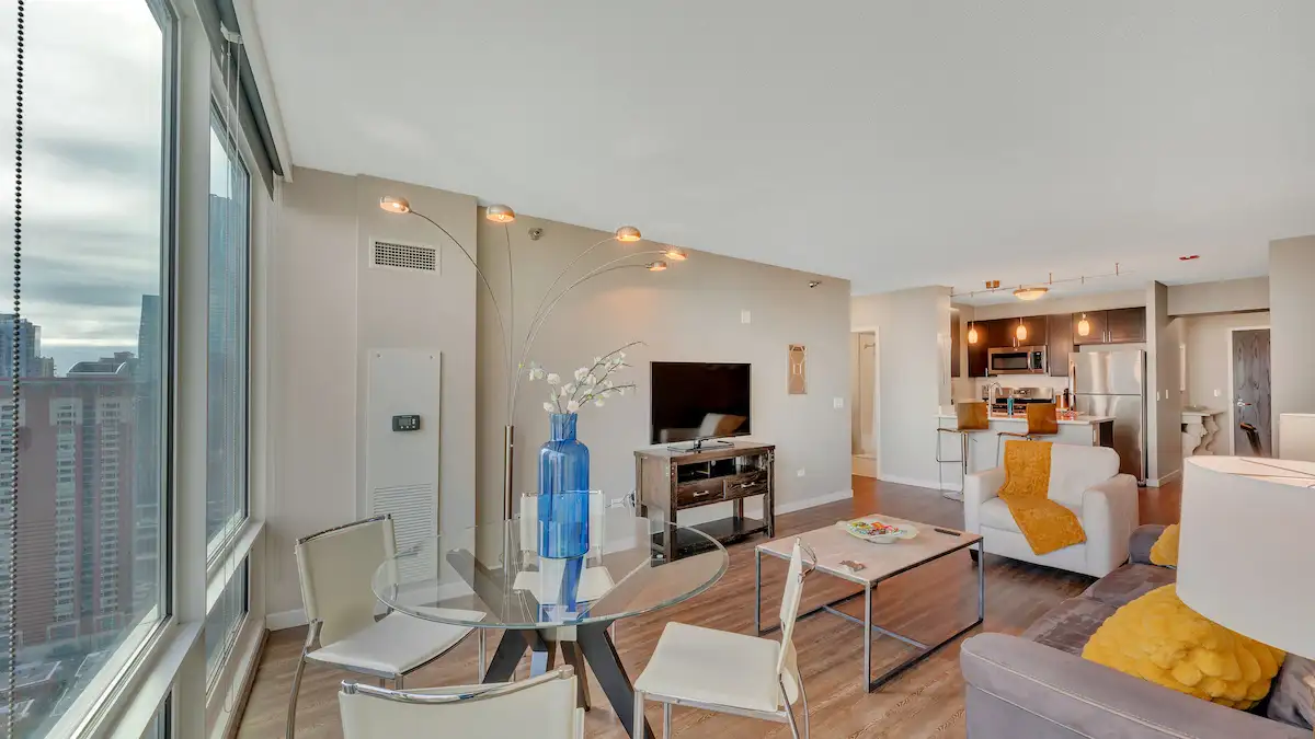 Group of professionals enjoying a luxury furnished corporate apartment in Downtown Chicago.