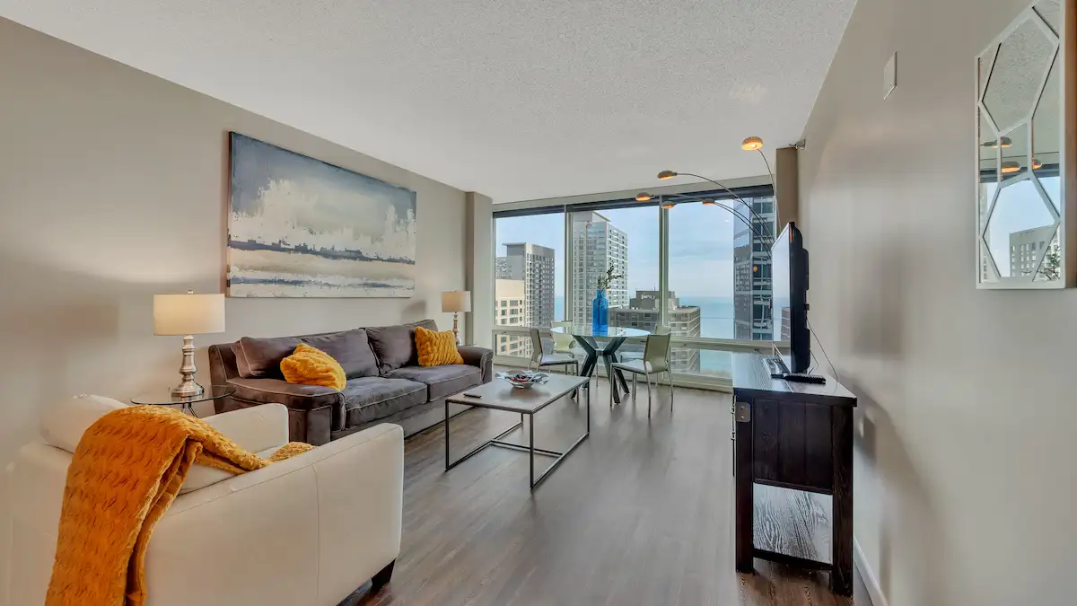 Group of professionals enjoying a luxury furnished corporate apartment in Downtown Chicago.