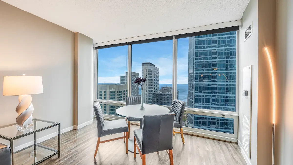Group of professionals enjoying a luxury furnished corporate apartment in Downtown Chicago.