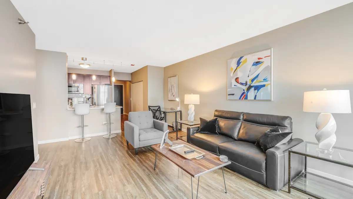 Group of professionals enjoying a luxury furnished corporate apartment in Downtown Chicago.