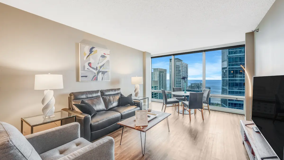 Group of professionals enjoying a luxury furnished corporate apartment in Downtown Chicago.