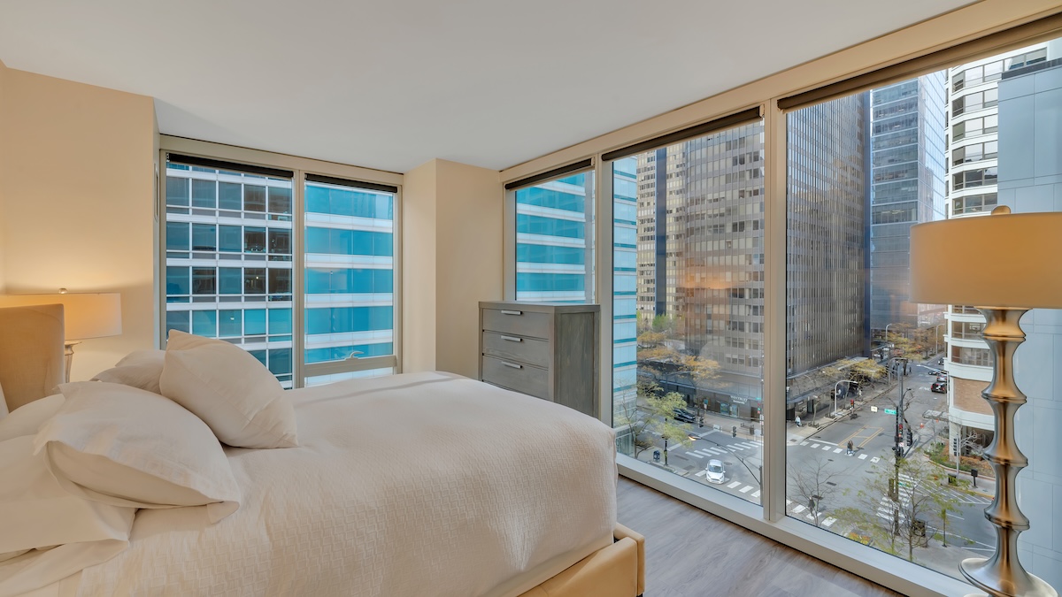 Group of professionals enjoying a luxury furnished corporate apartment in Downtown Chicago.