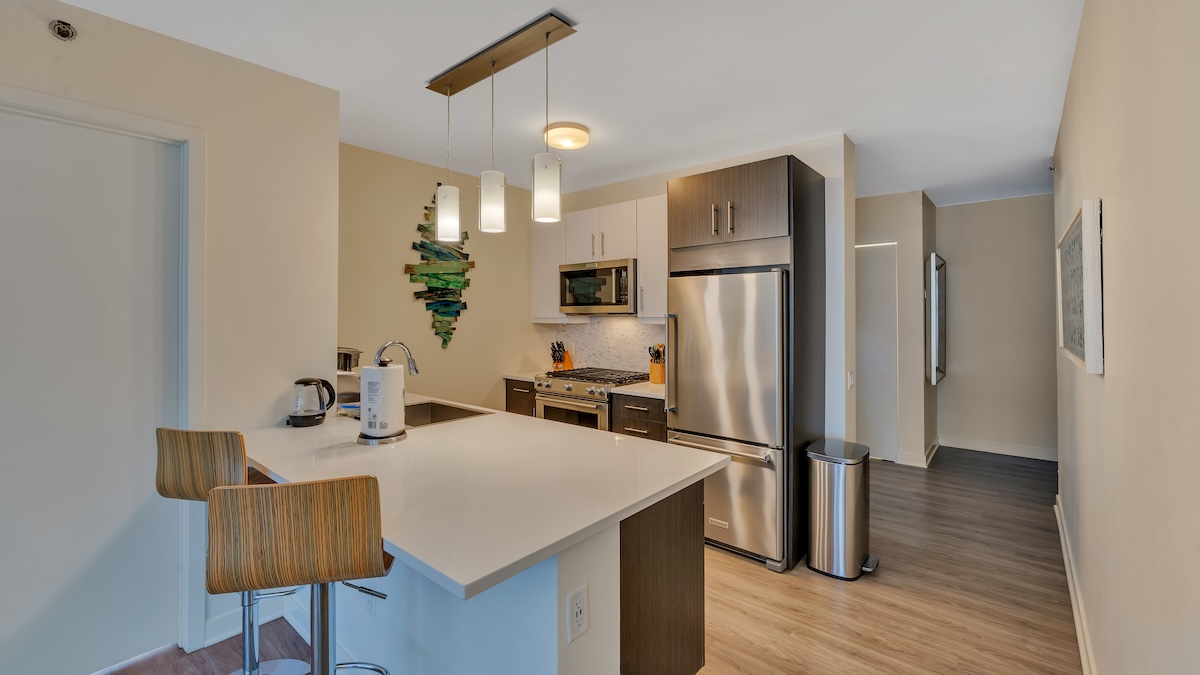 Group of professionals enjoying a luxury furnished corporate apartment in Downtown Chicago.